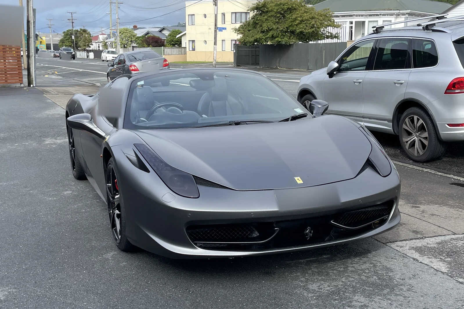 Grey Ferrari photographed from the front
