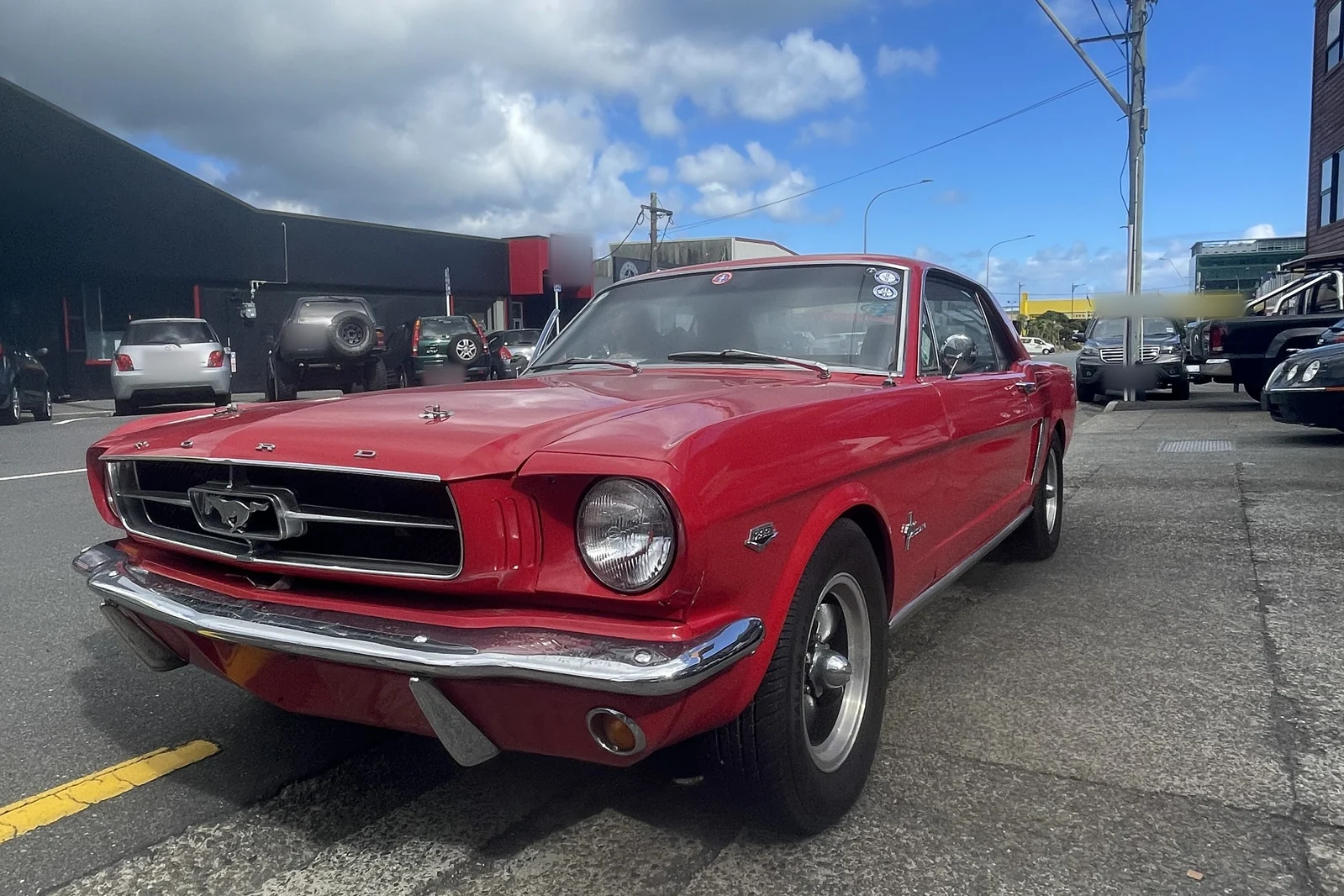 Classic red Ford Mustang photographed from the front